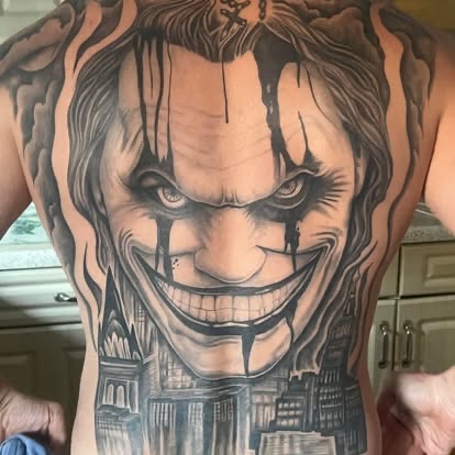 Horror clown face across a back