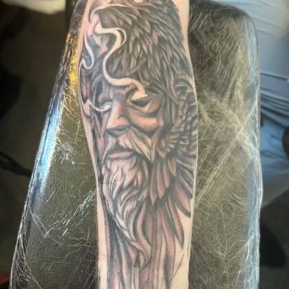 Bearded wizard on a forearm